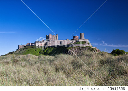 Bamburgh castle on top of the rock 13934868
