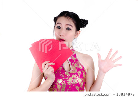 Surprise pretty chinese young woman holding red bags for happy c Surprise pretty chinese young woman holding red bags for happy c 13934972
