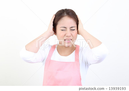 A woman holding a head holding a head 13939193