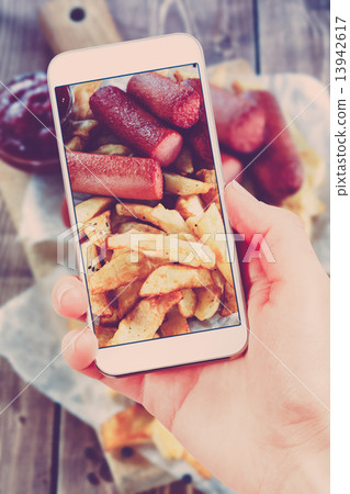 Using smartphones to take photos of Fried Potatoes and grilled s Using smartphones to take photos of Fried Potatoes and grilled s 13942617
