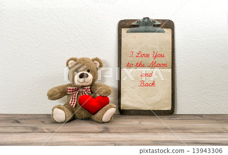 Teddy Bear with red heart and clipboard. Valentines Day concept 13943306
