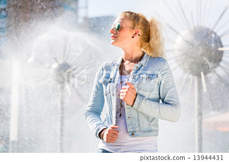 Woman at Fountain in Dresden Prager Strasse 13944431