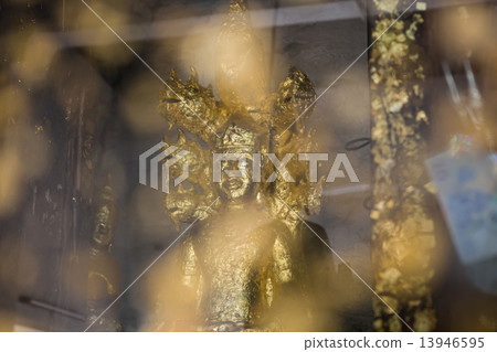 close up Buddha statue gilded in the measure 13946595