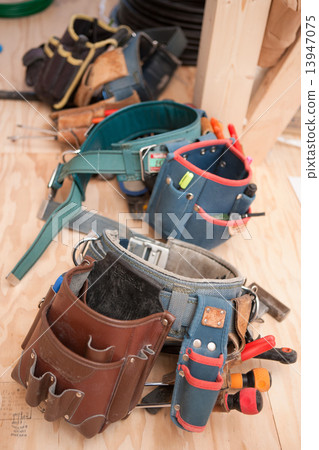 Housing construction site carpenters Housing construction site carpenters 13947075