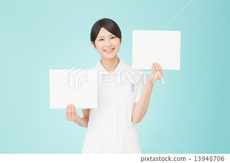A nurse with two message boards 13948706