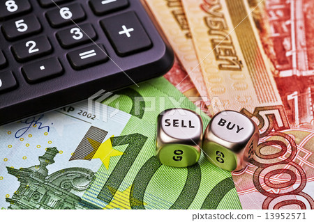 Dices cubes,calkulator,  EUR and Russian RUB baknotes as backgro 13952571