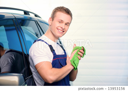 Car mechanic at the service station 13953156