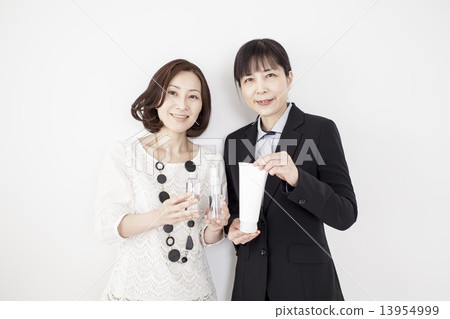 Two middle women who tried cosmetics 13954999
