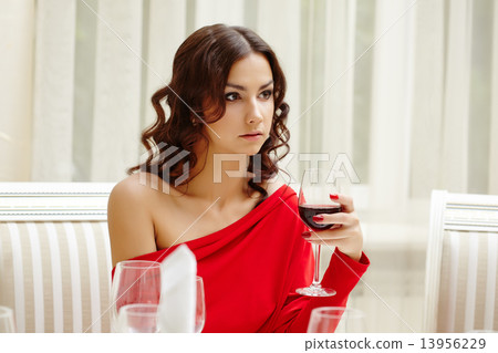 Elegant brunette over dinner in restaurant Elegant brunette over dinner in restaurant 13956229