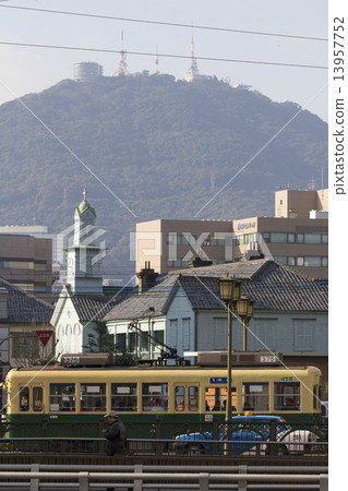Inasa-san and Old Dejima Theological Seminary and Tram Inasa-san and Old Dejima Theological Seminary and Tram 13957752