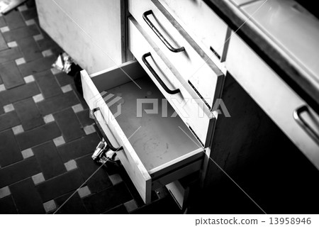 Cupboard with opened empty drawer Cupboard with opened empty drawer 13958946
