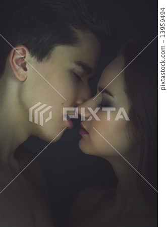 Kissing couple portrait. Instagram toned. 13959494