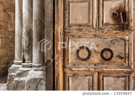 Wooden door at the entrance to Holy Sepulchre church. 13959947