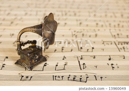 Gramophone on old sheet music Gramophone on old sheet music 13960049