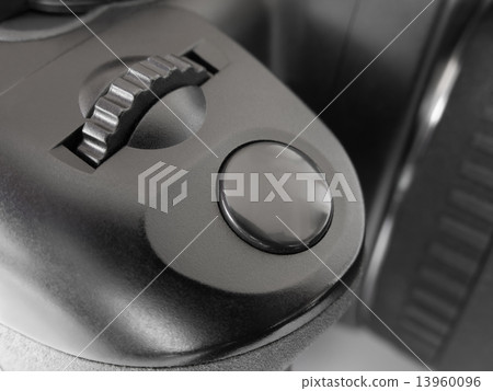 Button on photo camera 13960096