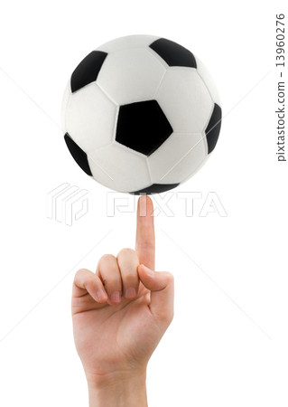 Hand and spinning soccer ball 13960276
