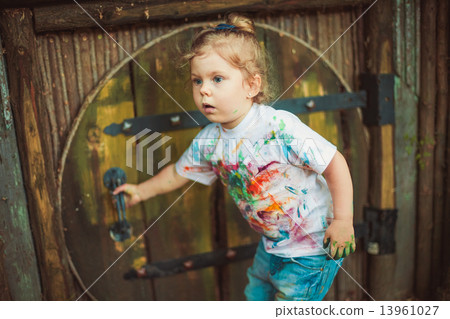 Girl near tiny house 13961027