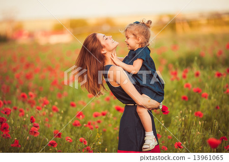 Mother with daughter outdoor 13961065