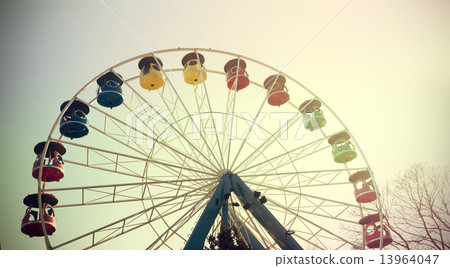 Retro vintage filtered picture of a ferris wheel. Retro vintage filtered picture of a ferris wheel. 13964047