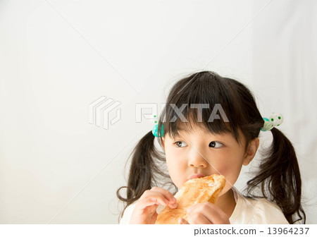 A girl who eats bread A girl who eats bread 13964237