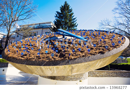 Pinwheels on the clock in front of state capitol of Kentucky 13968277