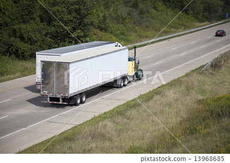 Two semi trucks on the highway Two semi trucks on the highway 13968685