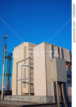 Radio cabinet on the cell tower site 13968884