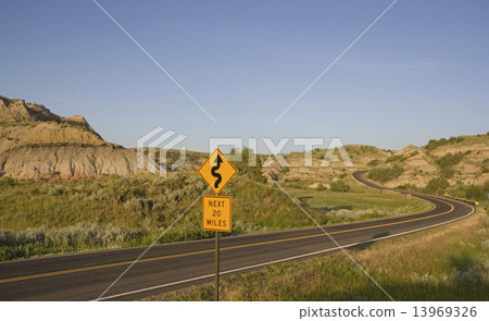 Curves next 20 miles 13969326
