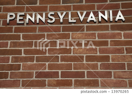 Pennsylvania sign on the brick wall 13970265