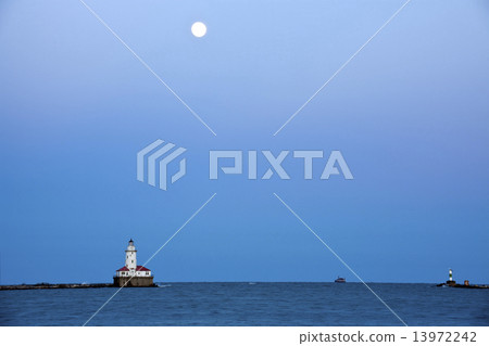Full Moon rising above Lake Michigan and Chicago Lighthouse 13972242
