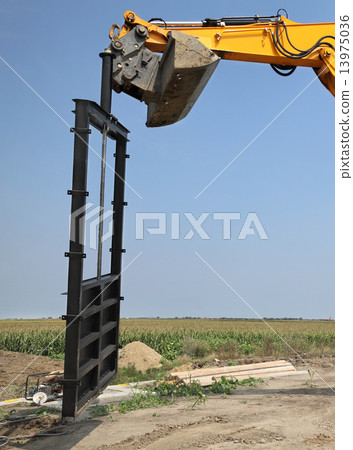 Agriculture, irrigation gate at channel construction site 13975036
