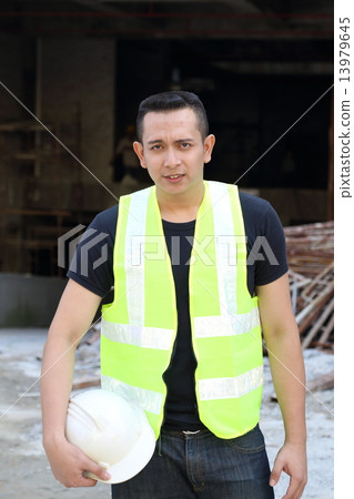 Man holding safety cap Man holding safety cap 13979645