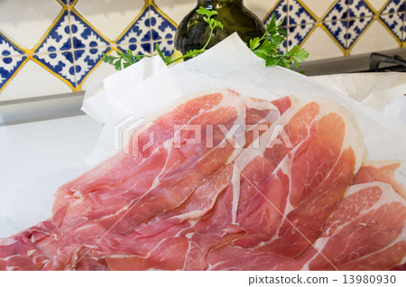 Thin sliced pieces of Italian ham 13980930