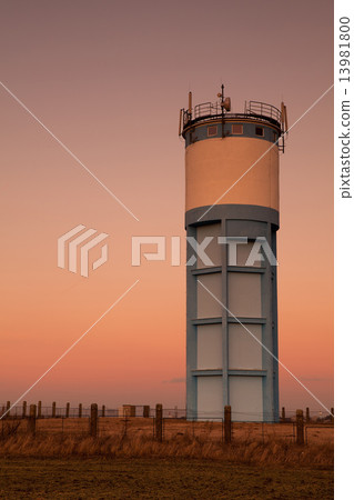 Historic water reservoir brick tower at sunset Historic water reservoir brick tower at sunset 13981800
