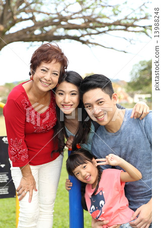 Three generation family at park Three generation family at park 13988248