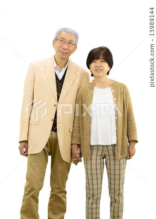 White back image of senior couple wearing casual wear 13989144