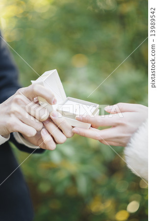 Men presenting gifts 13989542