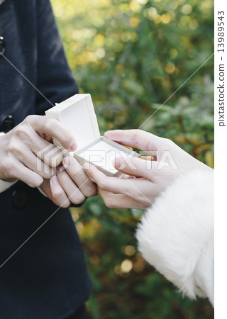 Men presenting gifts Men presenting gifts 13989543