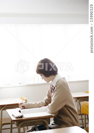 Female students taking classes Female students taking classes 13990329