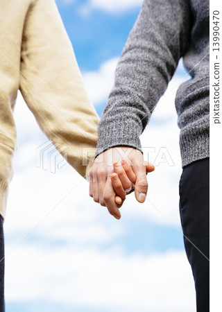 Student couple connecting hands Student couple connecting hands 13990470