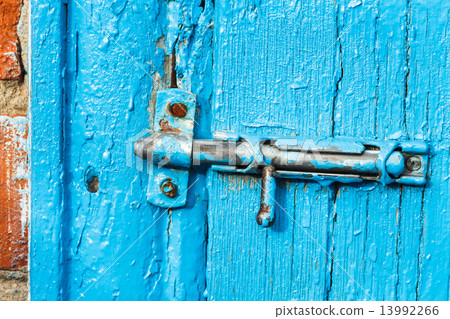 shabby espagnolette on old blue painted door shabby espagnolette on old blue painted door 13992266