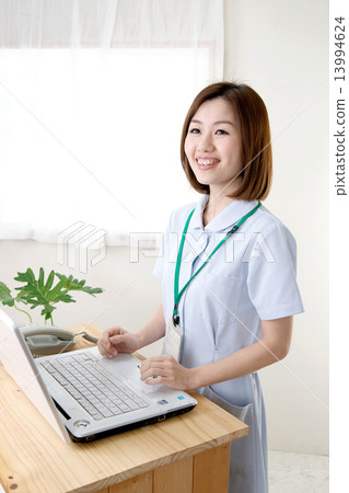 Reception desk of young nurse Reception desk of young nurse 13994624