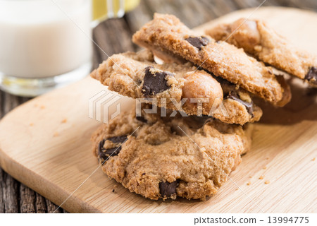 Stack of Chocolate chip cookie and glass of milk Stack of Chocolate chip cookie and glass of milk 13994775