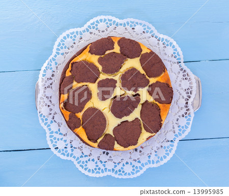 Russian chocolate cheesecake on a blue wooden background 13995985