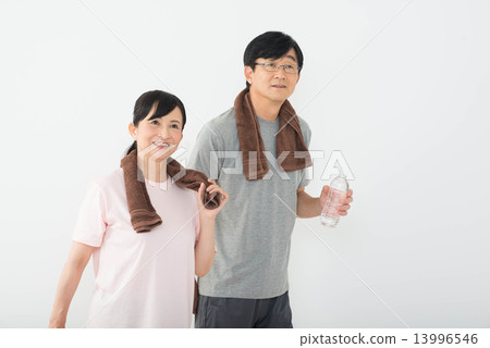 A couple going to a fitness club A couple going to a fitness club 13996546