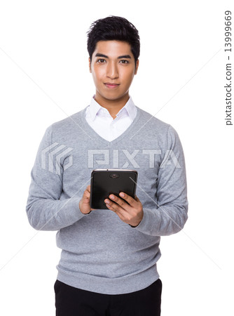 Businessman use of digital tablet Businessman use of digital tablet 13999669