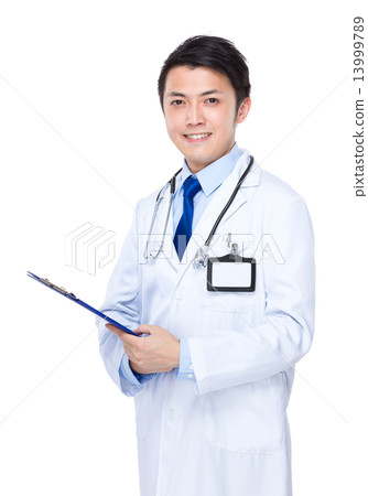 Doctor with clipboard 13999789
