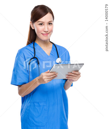 Doctor with tablet Doctor with tablet 14000579