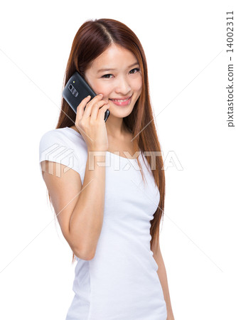 Woman talk to cellphone Woman talk to cellphone 14002311