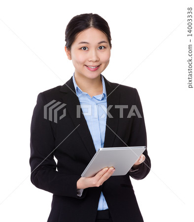 Businesswoman use of tablet Businesswoman use of tablet 14003338